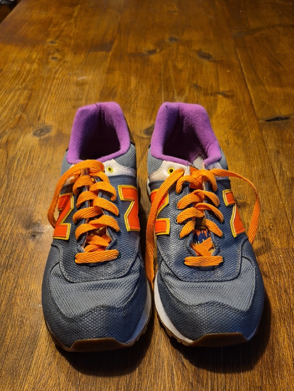 New Balance 574  Grey and Orange Athletic Sneakers with Purple Lining